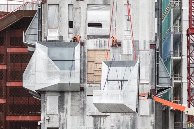 the Silo by COBE, The Silo Nordhavn, The Silo apartments, repurposed silo architecture, galvanized steel facade, adaptive reuse apartments, Nordhavn apartments, adaptive reuse silo