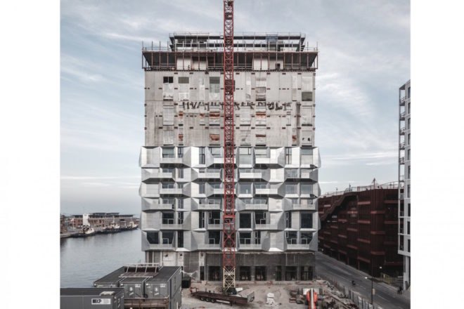 the Silo by COBE, The Silo Nordhavn, The Silo apartments, repurposed silo architecture, galvanized steel facade, adaptive reuse apartments, Nordhavn apartments, adaptive reuse silo