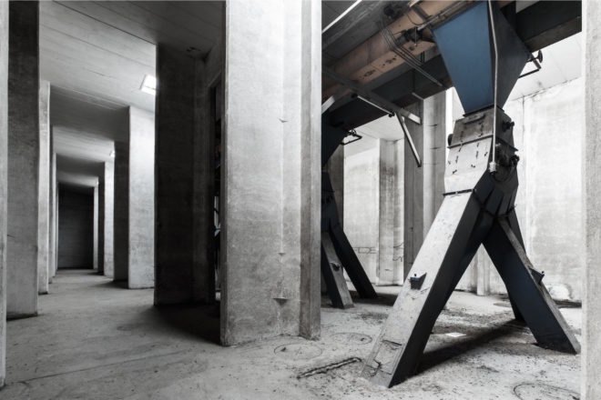 the Silo by COBE, The Silo Nordhavn, The Silo apartments, repurposed silo architecture, galvanized steel facade, adaptive reuse apartments, Nordhavn apartments, adaptive reuse silo