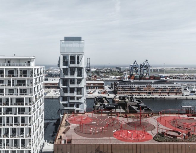 the Silo by COBE, The Silo Nordhavn, The Silo apartments, repurposed silo architecture, galvanized steel facade, adaptive reuse apartments, Nordhavn apartments, adaptive reuse silo