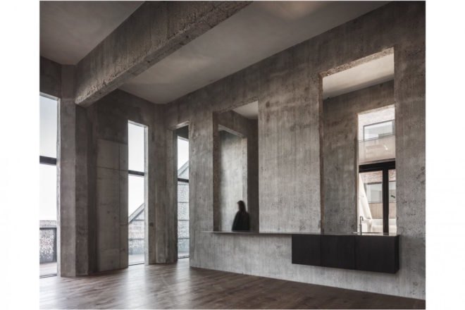 the Silo by COBE, The Silo Nordhavn, The Silo apartments, repurposed silo architecture, galvanized steel facade, adaptive reuse apartments, Nordhavn apartments, adaptive reuse silo