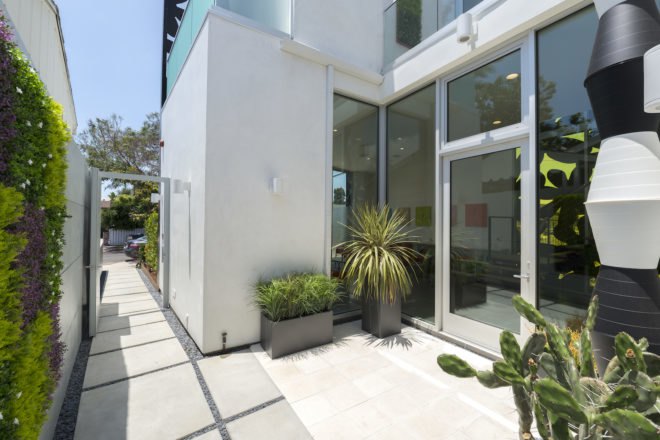 4016 Tivoli by Cameron McNall, Cameron McNall architect, 4016 Tivoli Los Angeles, 4016 Tivoli architecture, 4016 Tivoli house, LA smart tech house, unique Venice LA home, walkable home in Los Angeles, flower facade architecture, flower facade home, metal flower facade