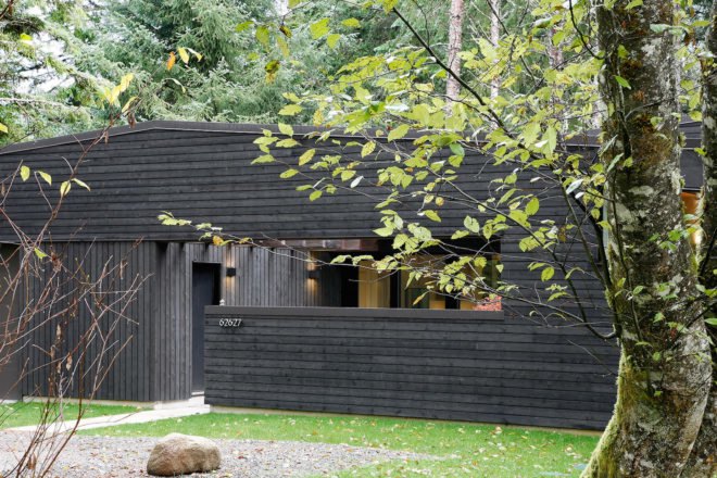Courtyard House on a River by Robert Hutchison Architecture, Greenwater modern architecture, small home living movement, western red cedar clad home, Seattle retreat, zen like retreat,