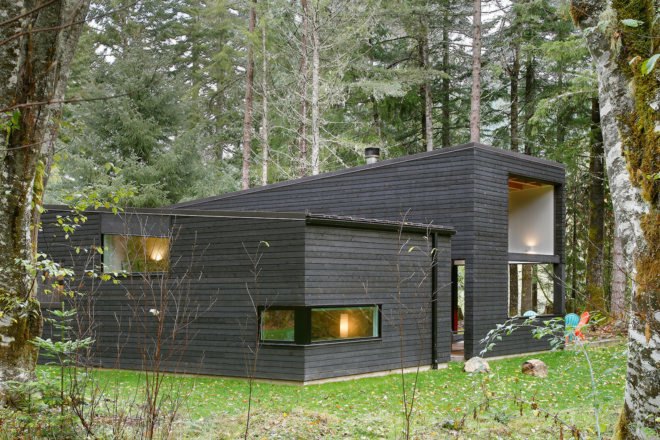Courtyard House on a River by Robert Hutchison Architecture, Greenwater modern architecture, small home living movement, western red cedar clad home, Seattle retreat, zen like retreat,