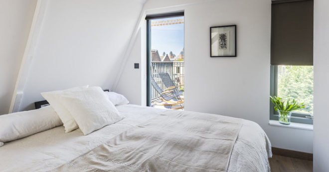 Deirdre Renniers, interior renovation, Amsterdam, space-saving furniture, green interior, open-plan layout, timber, flexible spaces