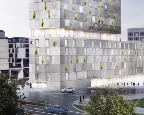 Mailänder Platz tower by RKW Architektur+, Stuttgart architecture, Stuttgart mixed use tower, Mailänder Platz architecture, Mailänder Platz tower, Mailänder Platz hotel, Mailänder Platz residences, grapevine green wall, grapevine on tower facade, stone-clad tower