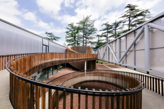 Mediathek, Laboratory of Architecture #3, Tbilisi library, multimedia library, library design, library architecture, wooden staircase, spiral staircase, architecture, wooden building materials, cantilevered buildings, rectangular buildings, library in Tbilisi, childrens library