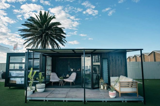 Contained, shipping containers, Shipping Container Hotel, portable shipping container hotel, shipping container building, shipping container designs, eco-friendly hotels, sustainable hotels, green hotels, moveable hotels, transportable hotels, shipping container buildings, reclaimed wood, sustainable building materials,