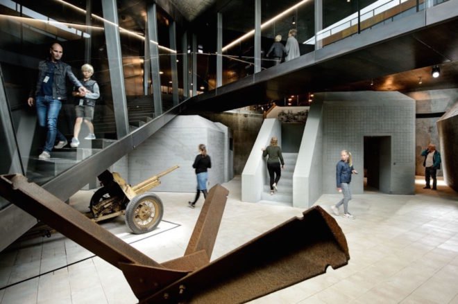 TIRPITZ by BIG, TIRPITZ by Tinker Imagineers, TIRPITZ by Varde Museums, TIRPITZ museum, TIRPITZ architecture, bunker museum, Blåvand museum, bunker adaptive reuse, war museum design, invisible museum