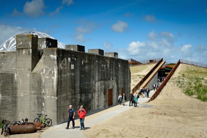 TIRPITZ by BIG, TIRPITZ by Tinker Imagineers, TIRPITZ by Varde Museums, TIRPITZ museum, TIRPITZ architecture, bunker museum, Blåvand museum, bunker adaptive reuse, war museum design, invisible museum