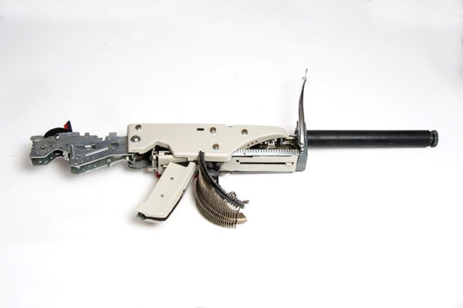 Typewriter Guns by Eric Nado, reconstructive artworks, typewriter guns, recycled typewriters, gun artworks, Underwood typewriters, vintage typewriter art, Eric Nado sculpture, recycled artworks by Eric Nado