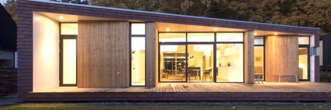 Villa Rypen by C.F. Moller, Aarhus modern home, Villa Rypen Aarhus, terra-cotta tilec screen facade, flexible interior layout for home, sliding doors interior design,