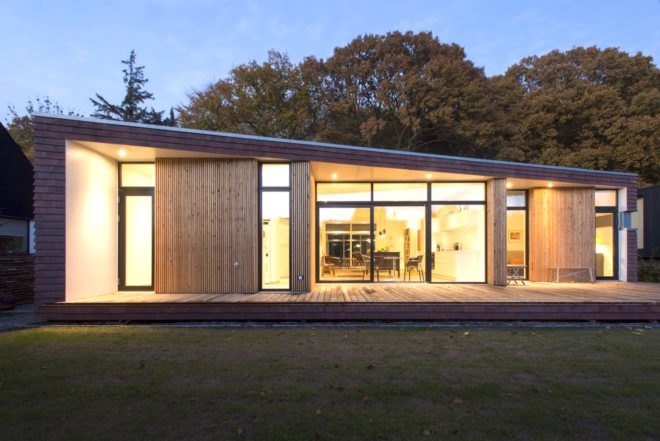 Villa Rypen by C.F. Moller, Aarhus modern home, Villa Rypen Aarhus, terra-cotta tilec screen facade, flexible interior layout for home, sliding doors interior design,