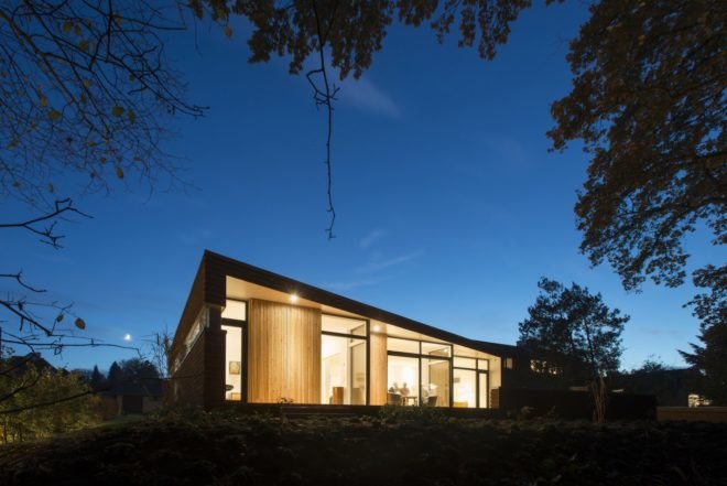 Villa Rypen by C.F. Moller, Aarhus modern home, Villa Rypen Aarhus, terra-cotta tilec screen facade, flexible interior layout for home, sliding doors interior design,