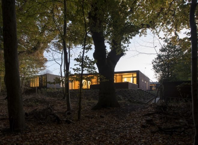 Villa Rypen by C.F. Moller, Aarhus modern home, Villa Rypen Aarhus, terra-cotta tilec screen facade, flexible interior layout for home, sliding doors interior design,