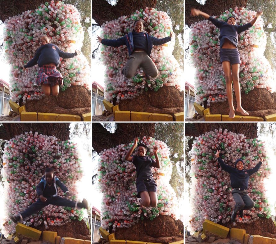 iThemba Tower by r1, iThemba Tower Spaza Art Garden, iThemba Tower Troyeville, recycled plastic bottle art, recycled bottle tower, Spaza Art Garden, Troyeville recycled materials, LED recycled art, eco art in South Africa, recycled materials into art South Africa, r1 South African artist