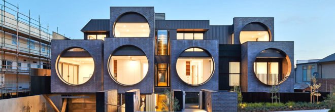 daylight, daylighting, architectural daylighting, Cirqua Apartments, BKK Architects, apartment block with circular windows, staggered apartment block in Melbourne