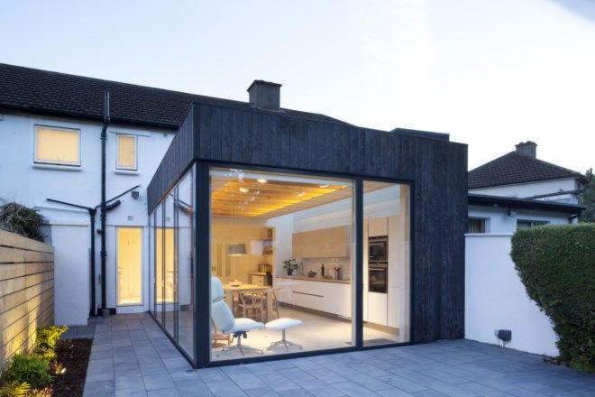 Copeland Grove by Stephen Kavanagh Architects, charred timber house extension, modern house extension, Copeland Grove in Dublin, timber and glass house box,