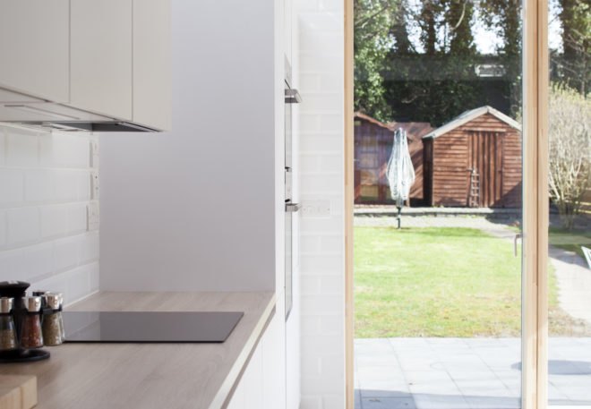 Copeland Grove by Stephen Kavanagh Architects, charred timber house extension, modern house extension, Copeland Grove in Dublin, timber and glass house box,
