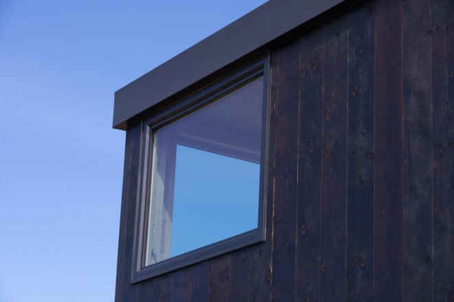 Escape RV, Escape tiny home, Escape ONE XL, luxury tiny home, mobile charred timber tiny home, timber handcrafted rv, off-grid tiny home, tiny home for eight people,