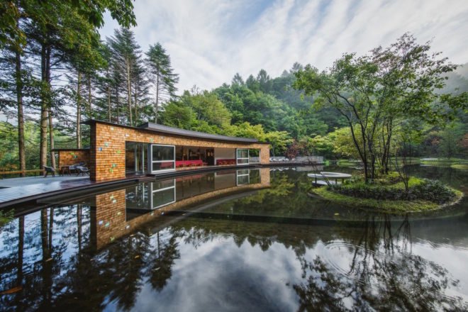 Picchio Ice Rink Visitors Center by Klein Dytham architecture, Picchio Ice Rink Visitors Center, Picchio Ice Rink, semi-natural ice rink, cedar shingle facade, Studio on Site, Mount Asama resort, Hoshinoya resort architecture, KERA-IKE ice rink,