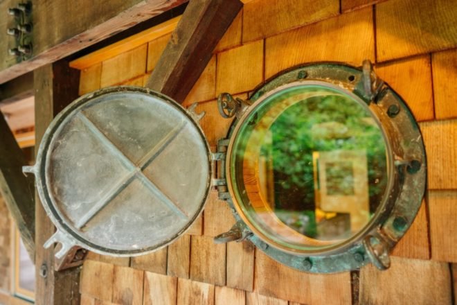 Jason McLennan, tree house tower, pugent sound tree house, seattle architecture, leo decaprio, reclaimed wood, reclaimed boat parts, home design, interior design, reclaimed furniture, green interior design, green architecture, porthole windows, Bainbridge Island, Bainbridge Island homes,