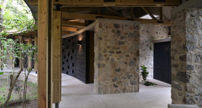 Casa Amacueca, CoA arquitectura, Departamento de Arquitectura, timber, stone, retreat, Mexico, concrete, wooden walkway, gable roof, natural light, courtyard