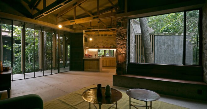 Casa Amacueca, CoA arquitectura, Departamento de Arquitectura, timber, stone, retreat, Mexico, concrete, wooden walkway, gable roof, natural light, courtyard