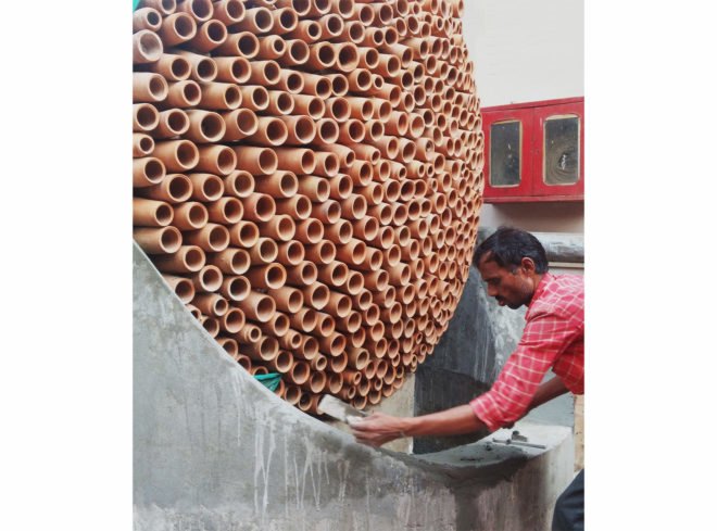 Ant Studio, DEKI Electronics air conditioner, natural cooling installation, evaporative cooling clay installation, zero energy air conditioner, evaporation and clay art, beautiful air conditioners