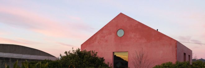 Red House by Extrastudio, Red House in Azeitao, winery transformed into home, adaptive reuse winery, Portugal adaptive reuse, contemporary architecture Portugal, minimalist and modern Portugal interior design, black glass sliding doors,