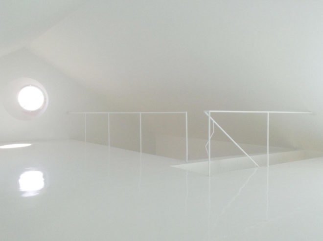 Red House by Extrastudio, Red House in Azeitao, winery transformed into home, adaptive reuse winery, Portugal adaptive reuse, contemporary architecture Portugal, minimalist and modern Portugal interior design, black glass sliding doors,