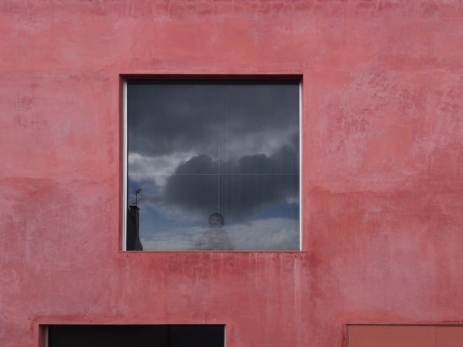 Red House by Extrastudio, Red House in Azeitao, winery transformed into home, adaptive reuse winery, Portugal adaptive reuse, contemporary architecture Portugal, minimalist and modern Portugal interior design, black glass sliding doors,