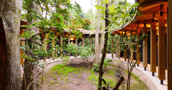 Casa Amacueca, CoA arquitectura, Departamento de Arquitectura, timber, stone, retreat, Mexico, concrete, wooden walkway, gable roof, natural light, courtyard