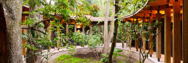 Casa Amacueca, CoA arquitectura, Departamento de Arquitectura, timber, stone, retreat, Mexico, concrete, wooden walkway, gable roof, natural light, courtyard
