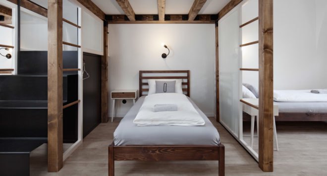 Denisa Strmiskova Studio, Long Story Short Hostel, green renovation, historic building, Czech Republic, modernist furniture, vaulted ceiling, green interior, local craftsmen, natural materials