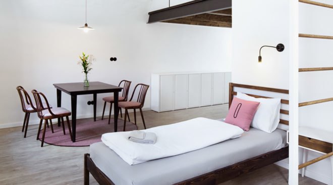 Denisa Strmiskova Studio, Long Story Short Hostel, green renovation, historic building, Czech Republic, modernist furniture, vaulted ceiling, green interior, local craftsmen, natural materials