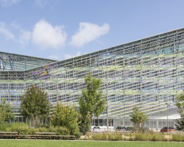 Métropole Rouen Normandie by Jacques Ferrier Architecture, Métropole Rouen Normandie, iridescent architecture, iridescent buildings, Monet-inspired architecture, double skin facade France, solar-powered Metropole building, colored glass with metal oxide