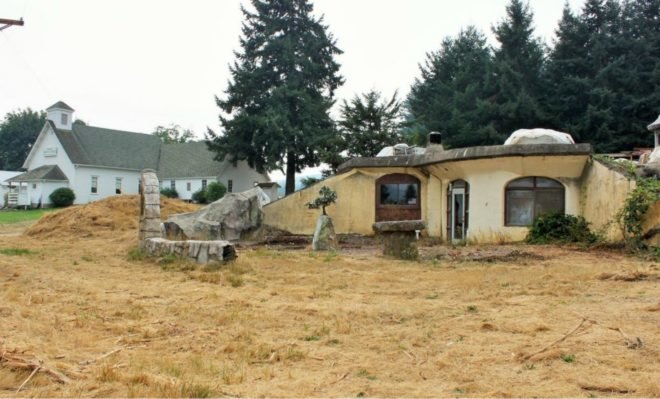 Nolan Scheid, Nolie Scheid, dome homes, concrete lord of the rings home, odd architecture, dome architecture, stone homes, off grid homes, dome homes for sale, oregon homes, domed architecture, off grid home design, natural light, lorrane home, oregon homes for sale, reclaimed wood flooring
