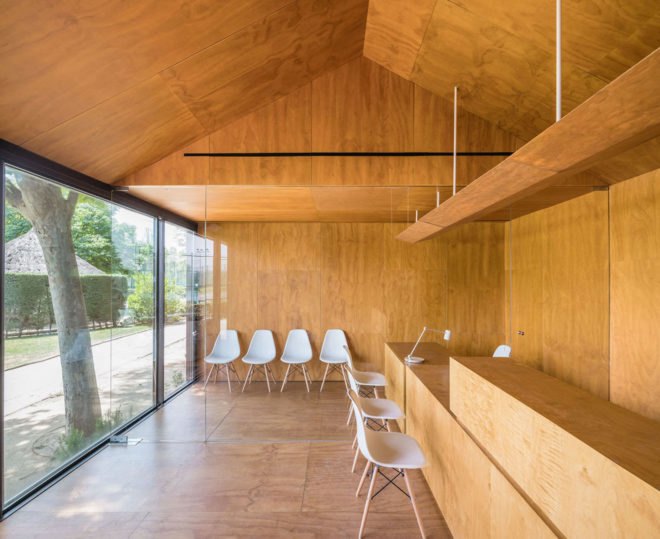 Tennis & Padel school office by BETA.o architecture office, BETA.ø architecture office, prefab office, prefabricated steel architecture, Madrid contemporary office architecture, pine plywood paneling, minimal site impact office design