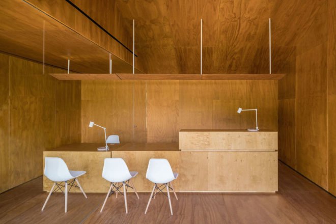Tennis & Padel school office by BETA.o architecture office, BETA.ø architecture office, prefab office, prefabricated steel architecture, Madrid contemporary office architecture, pine plywood paneling, minimal site impact office design