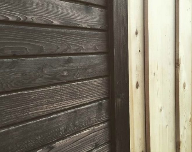 Legacy Tiny House, Wood & Heart building company, tiny home design, reclaimed materials, sustainable tiny homes, charred timber homes, shou sugi ban wood, reclaimed timber, tiny homes for sale, off grid living, minimalist living, wooden planks, reclaimed timber,