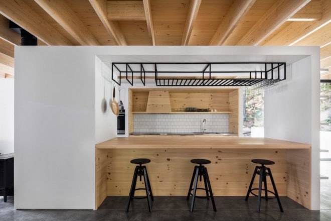 The Rock by Atelier General, The Rock house Quebec, Quebec forest cabin, black painted timber home, black painted timber architecture, Canada forest architecture,