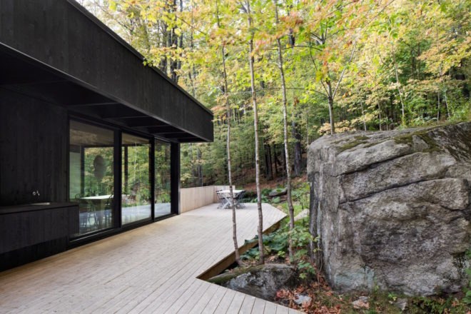 The Rock by Atelier General, The Rock house Quebec, Quebec forest cabin, black painted timber home, black painted timber architecture, Canada forest architecture,