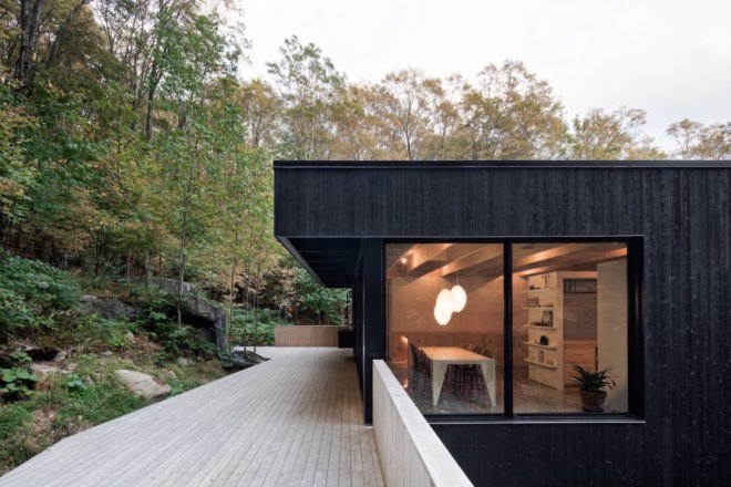 The Rock by Atelier General, The Rock house Quebec, Quebec forest cabin, black painted timber home, black painted timber architecture, Canada forest architecture,