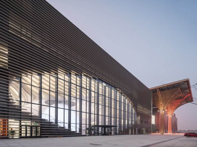 Tianjin Binhai Library by MVRDV, Tianjin Binhai Library, China public library, futuristic libraries, eye-shaped buildings, illuminated topography, undulating bookshelves, spherical auditorium