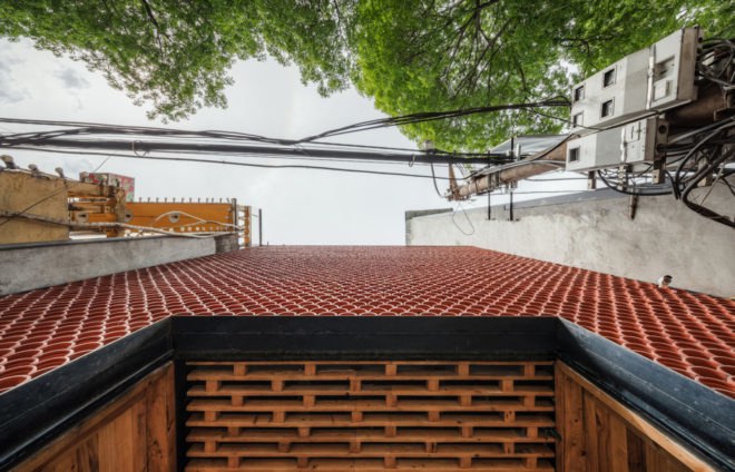 Koi Café, aquarium, Hanoi, Farming Architects, aquaponics, ecosystem, Vietnam, green interior, waterfall, sustainable food