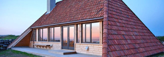 Selestranda House, green renovation, cottage, Norway, bark arkitekter, pitched roof, open-plan layout, green architecture, panoramic views, drystone walls, gable-roof, gable