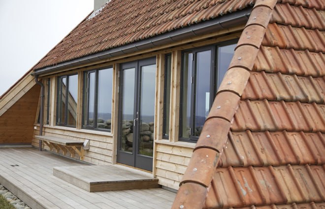 Selestranda House, green renovation, cottage, Norway, bark arkitekter, pitched roof, open-plan layout, green architecture, panoramic views, drystone walls, gable-roof, gable