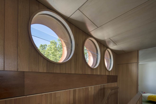 True North by TANDEM Design Studio, pleated steel facade, renovated stables, stables house project, TANDEM Design Studio, curvaceous homes, buildings on triangular plots, insulated double brick construction,
