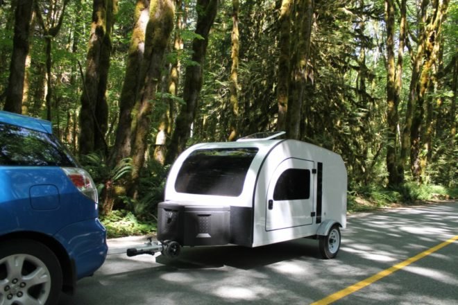 Droplet, Droplet trailer, Droplet tow-able getaway, off grid trailer, tow trailer, off grid living, tiny spaces, tiny homes, tiny trailers, droplet camper. space-efficient trailer, on the road campers, towing campers, camping pods, cute camping pods, camping pods with kitchens, led lighting, camping solutions,